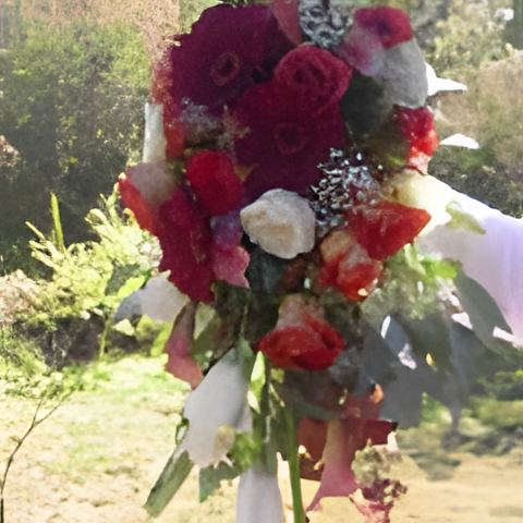 Cascade bouquet with leonidas roses, lisianthus, dwarf callas, gerberas