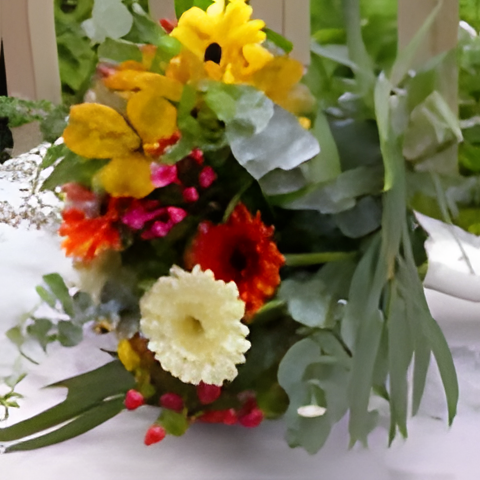 Posy bouquet with eucalyptus, alstroemeria, germinis, hypericum